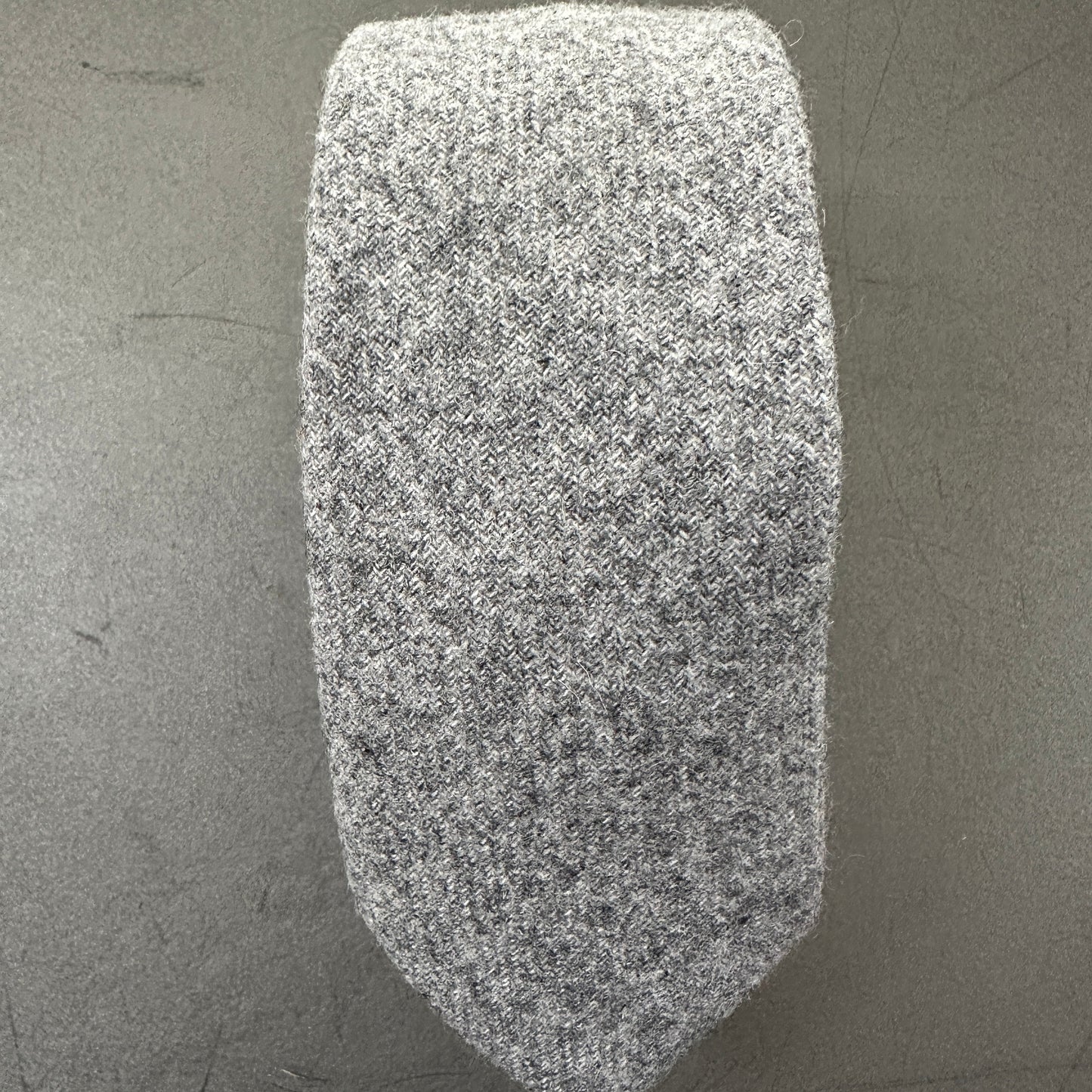 Grey wool tie for men which is perfect for a navy or black suit.