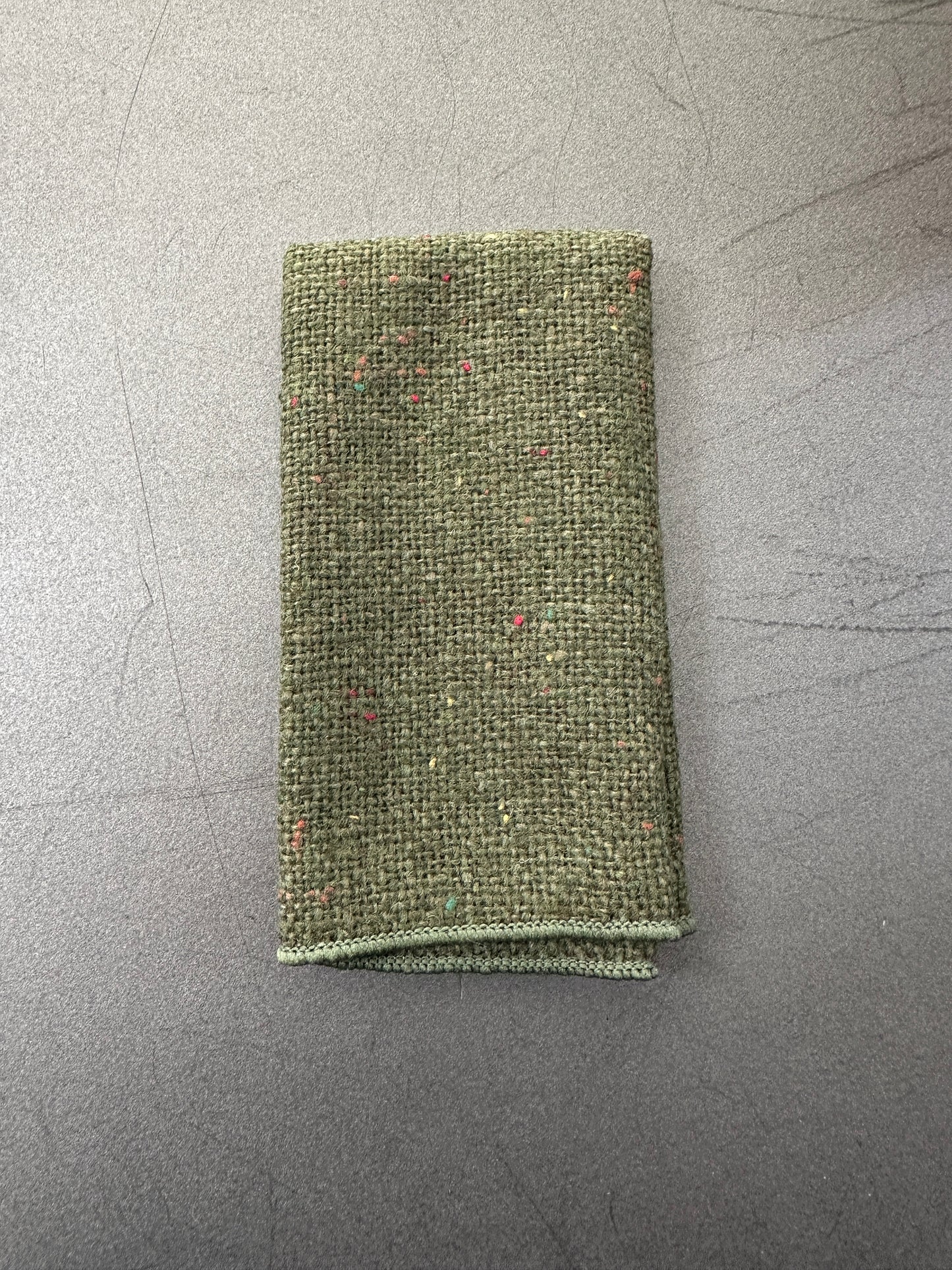 A green wool pocket square for men and ideal EDC hanks.