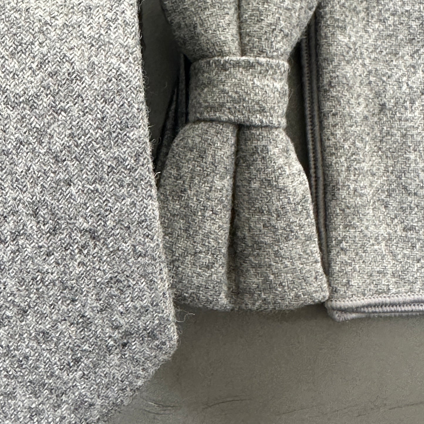 A grey wool tie, bow tie and pocket square set for men. Ideal as grooms and groomsmen ties or for graduations.