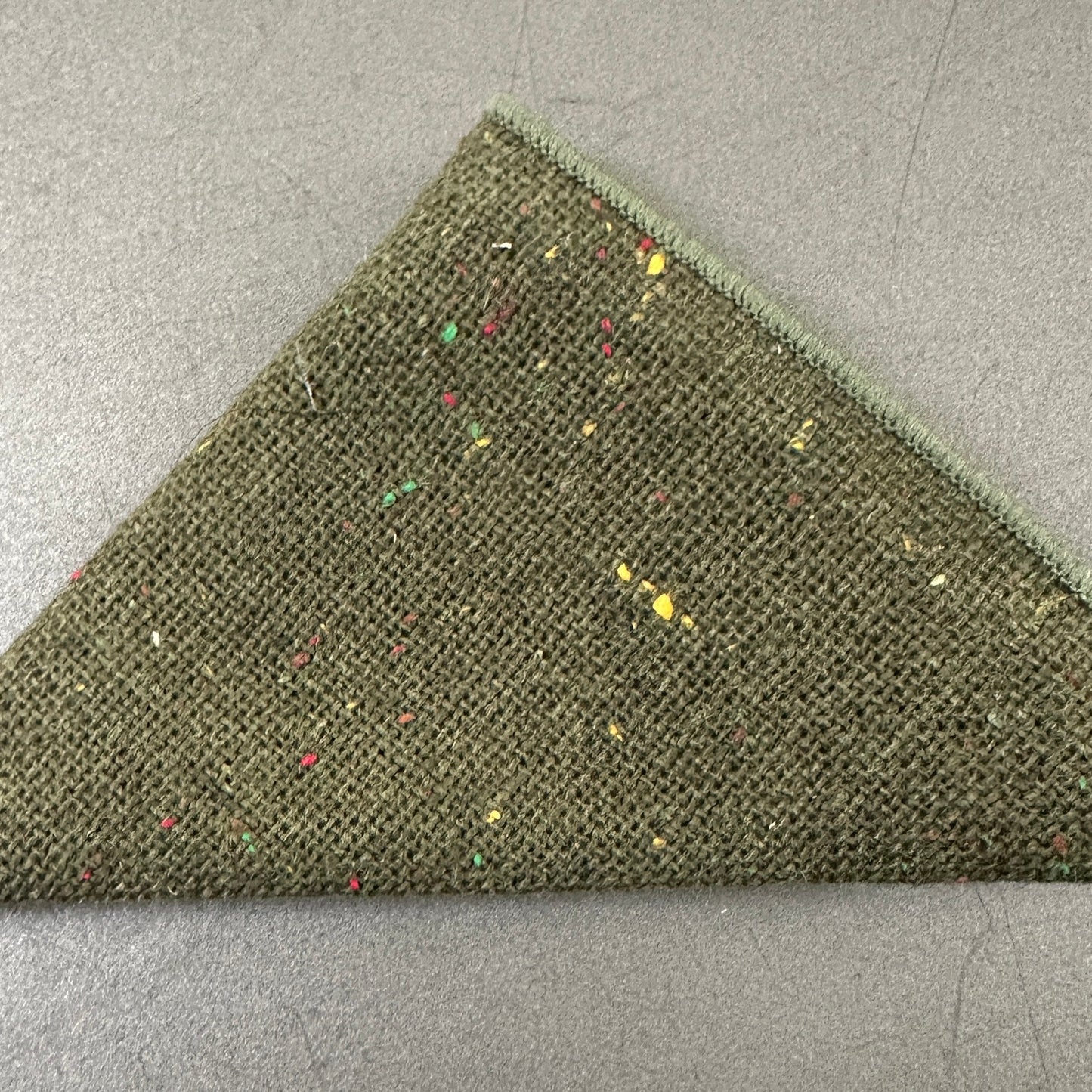 A green wool pocket square as part of a set of five wool pocket squares for mens gifts and groomsmen gifts. These make excellent EDC hanks for everyday carry.