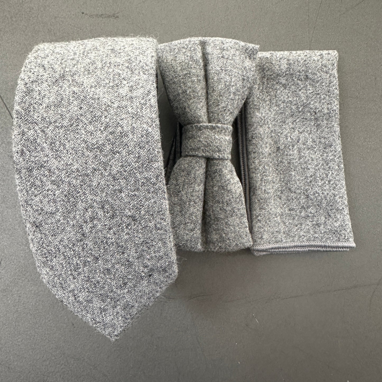 A tie, bow tie and pocket square set for men. The set makes an ideal wedding tie and bow tie. The pocket square is an excellent EDC hank.