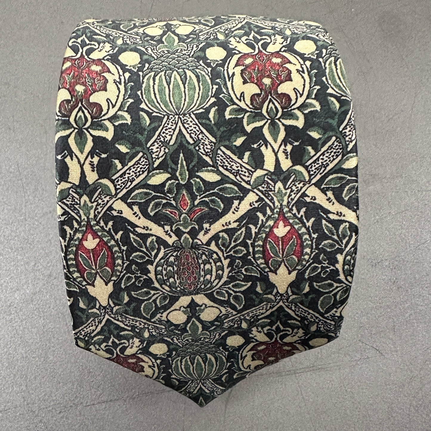 Green and red art printed tie for weddings and formal events.