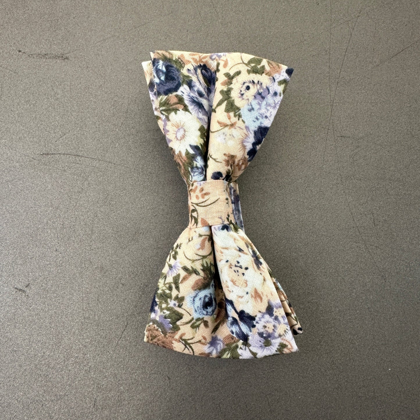 A Blue floral wedding bow tie and pocket square set for men