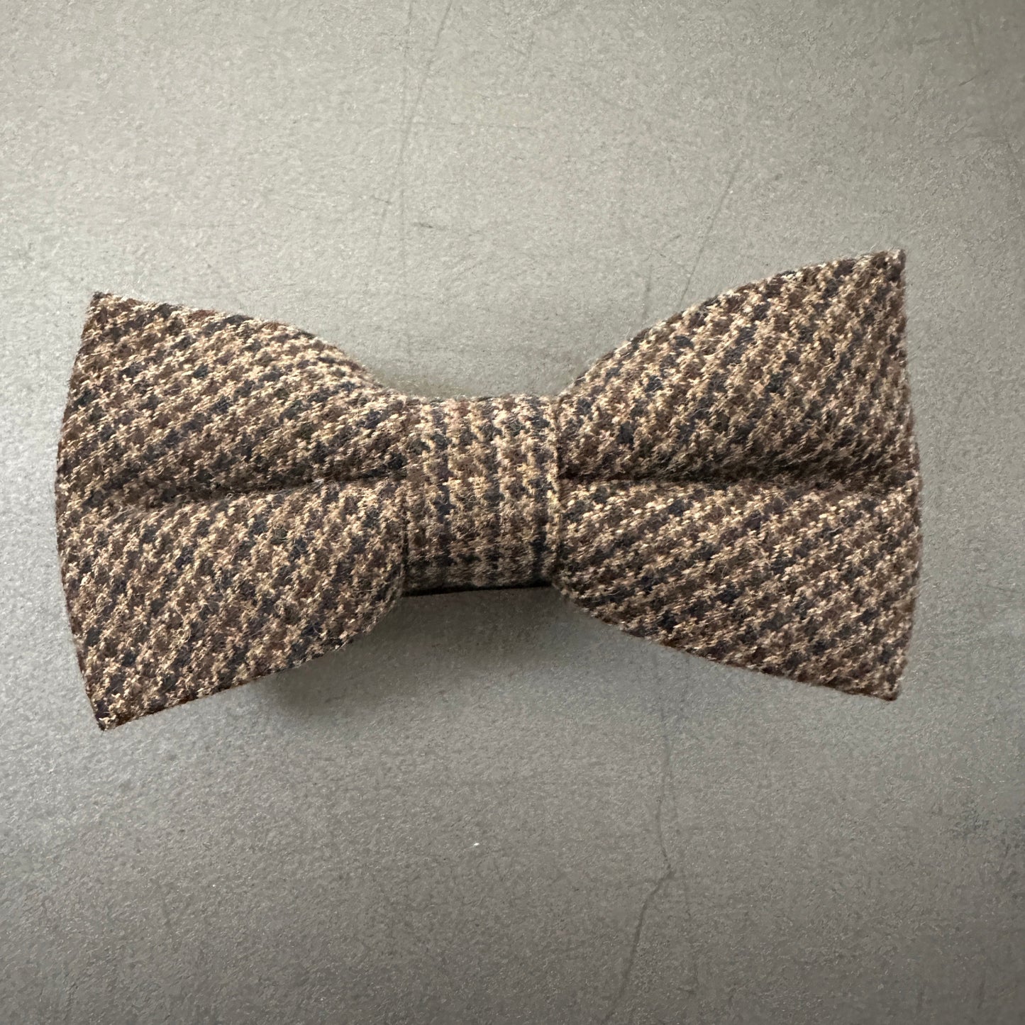 A brown check wool bow tie. Ideal for mens gifts and comes with free gift wrap.