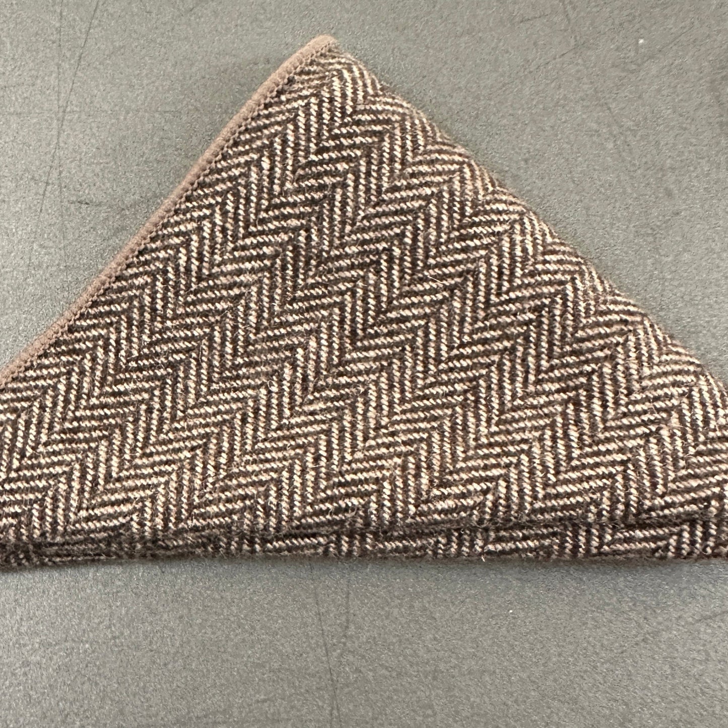 A brown herringbone pocket square as part of a set of five wool pocket squares for mens gifts and groomsmen gifts. These make excellent EDC hanks for everyday carry.