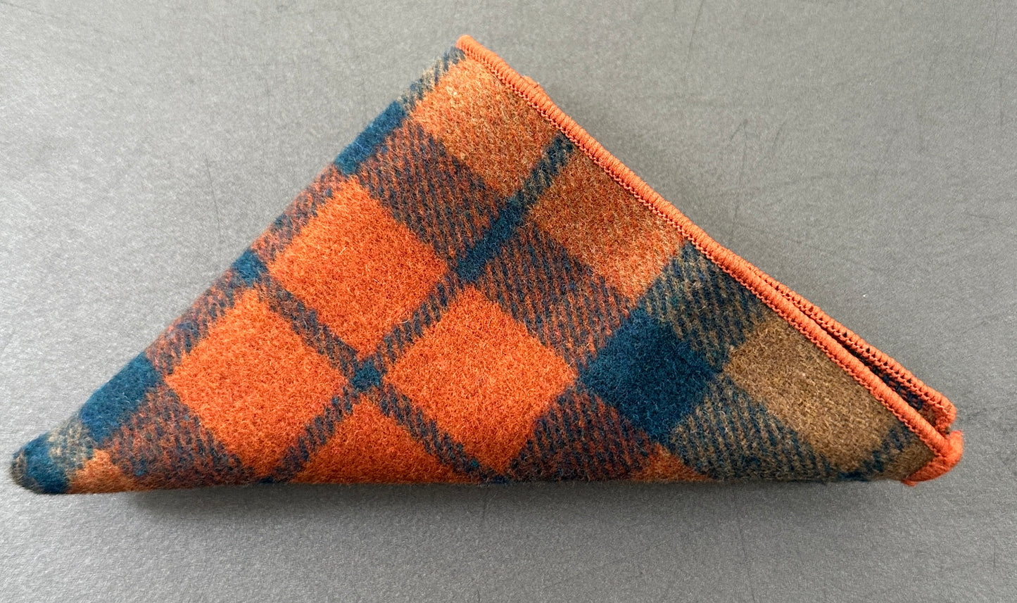 A burnt orange and navy check mens hanky in wool.