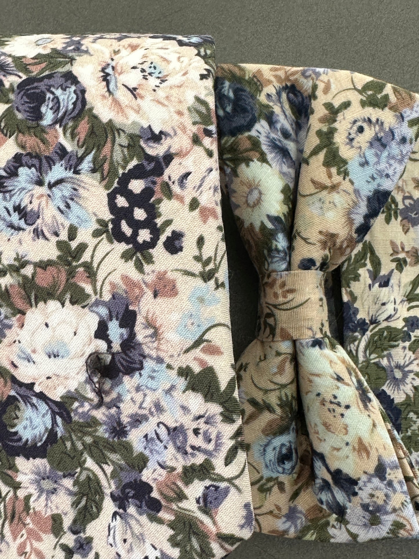 A Blue floral wedding tie, bow tie and pocket square set for groomsmen and grooms.