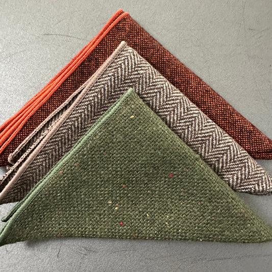 A set of three mens hankies in wool. THe set is in burnt orange, green and brown herringbone and make ideal mens hanky gifts, groomsmen gifts and EDC hanks for revery day carry.