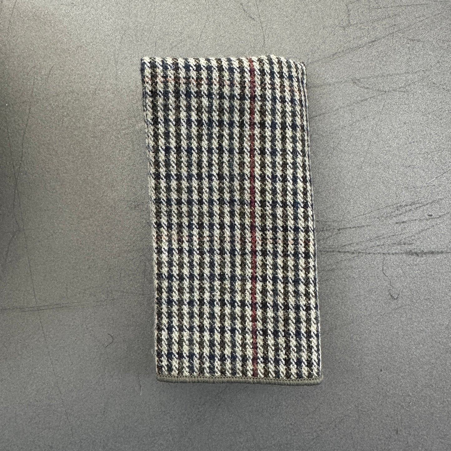 A grey wool checked pocket square ideal as an edc hank.