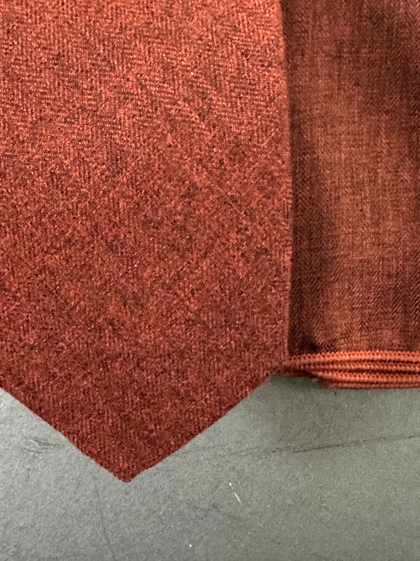 A burnt orange mens tie and pocket square set ideal for wedding ties. Perfect orange weeding ties for grooms and groomsmen.