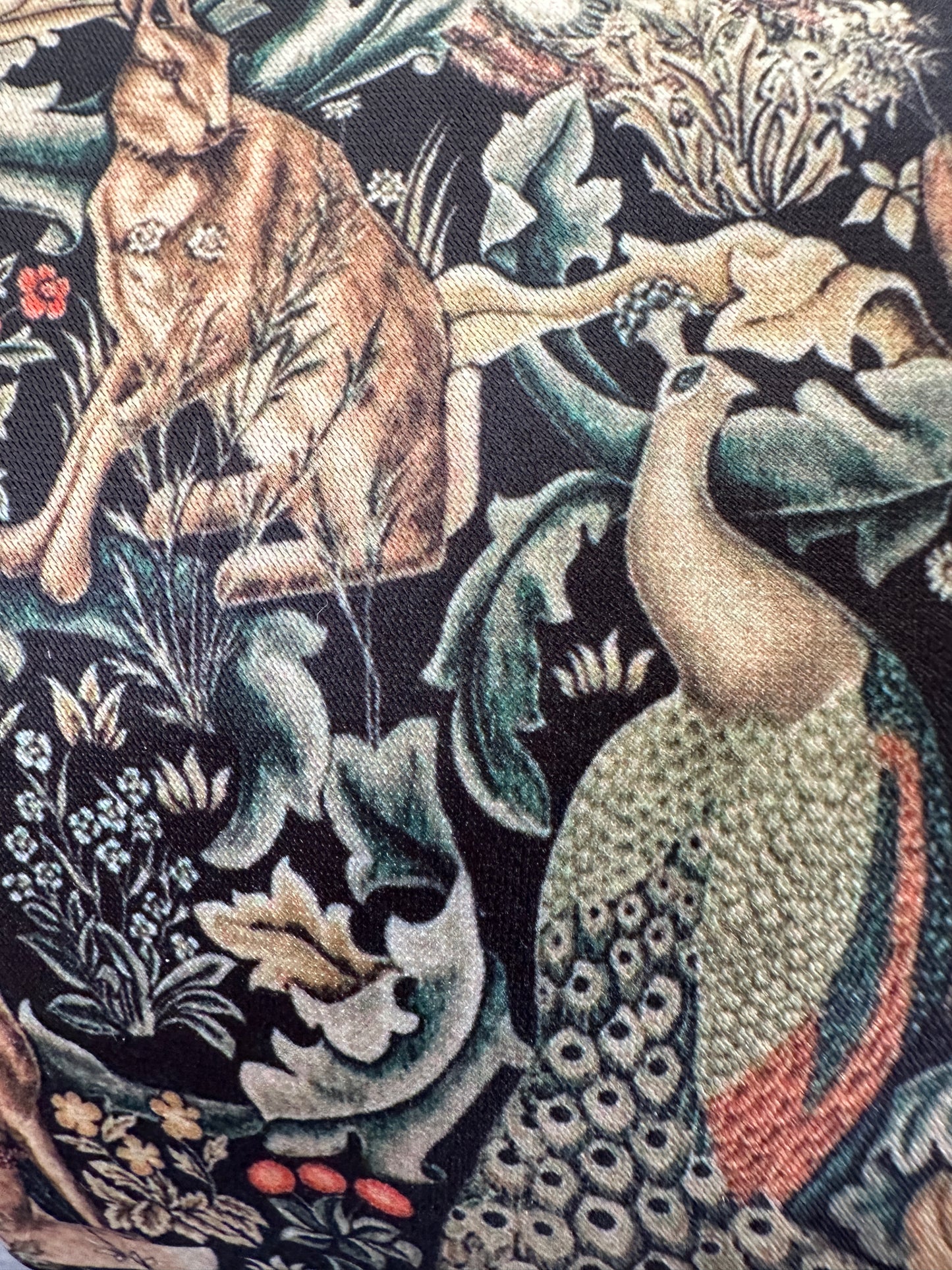 A men's tie made in a peacock and hare hunting and country fabric.