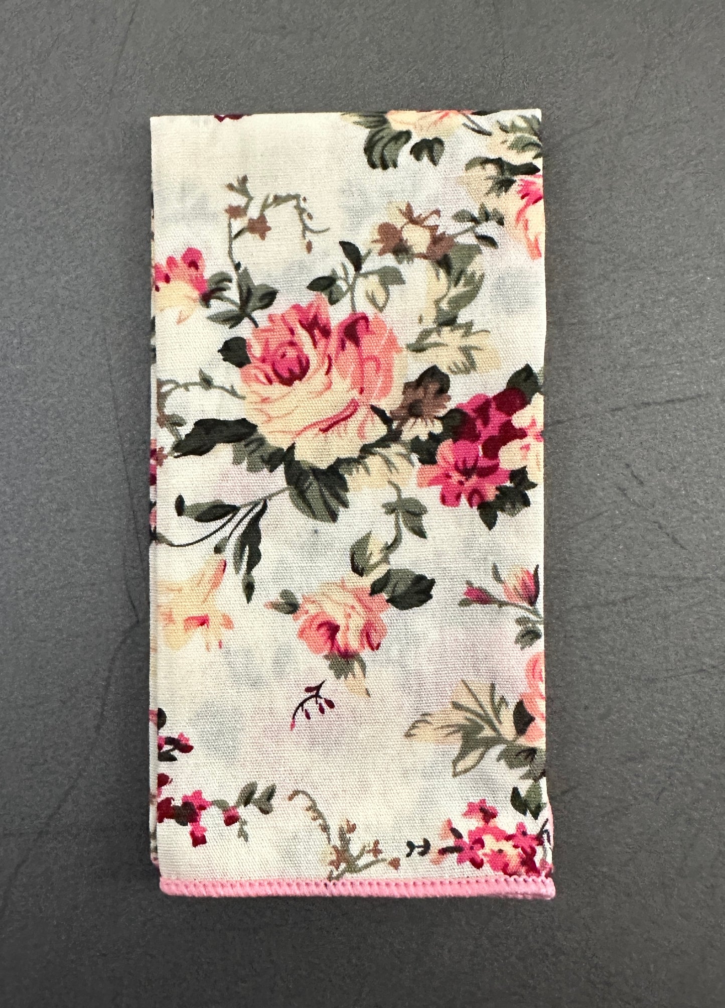 A pink floral pocket square for men ideal for shocking pink wedding ties.