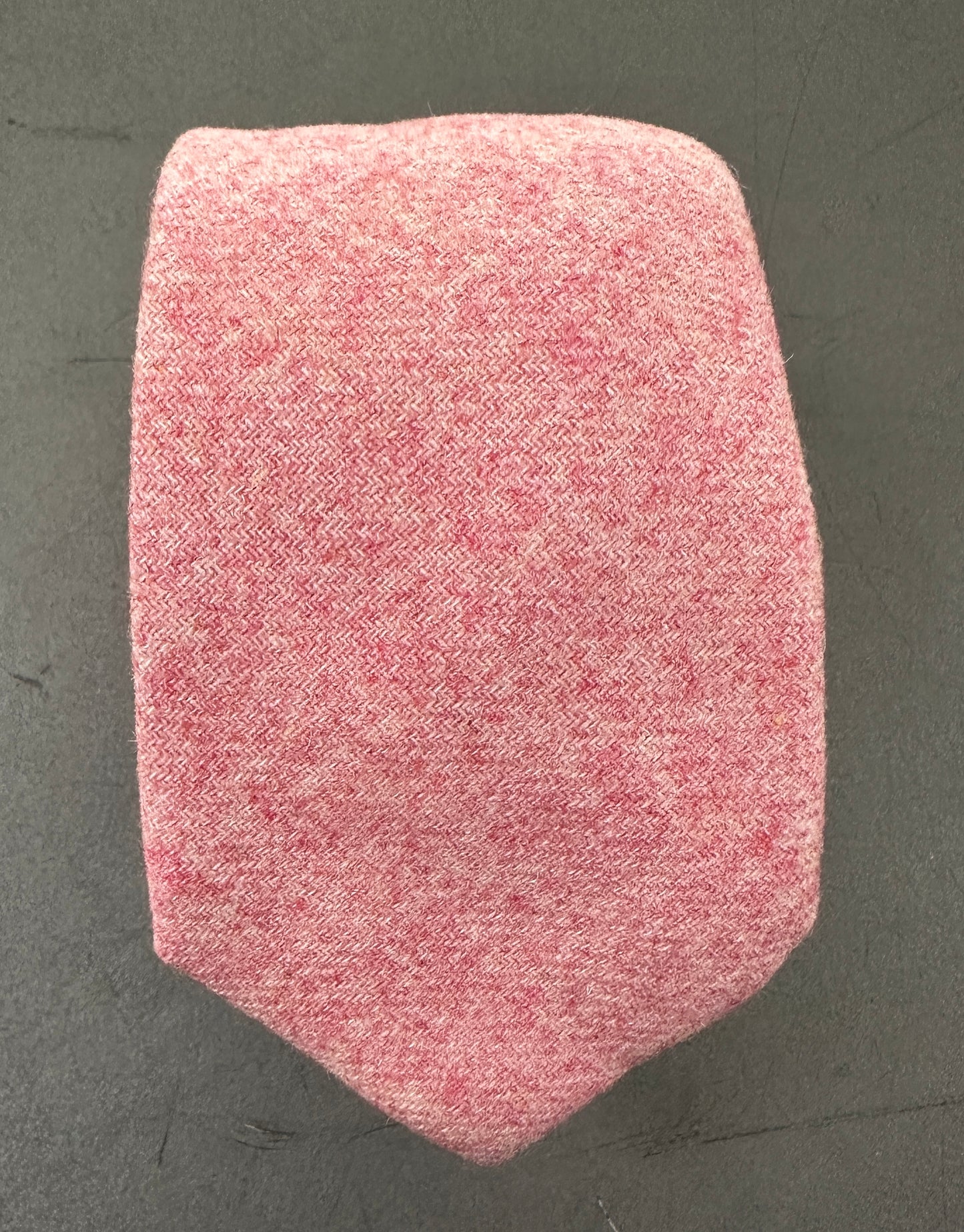 A pink tie in blush pink wool for grooms and groomsmen.