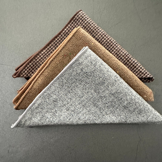 A set of three wool -pocket squares for men ideal as mens gifts, groomsmen gifts and EDC hanks. The set comes with free gift wrap.