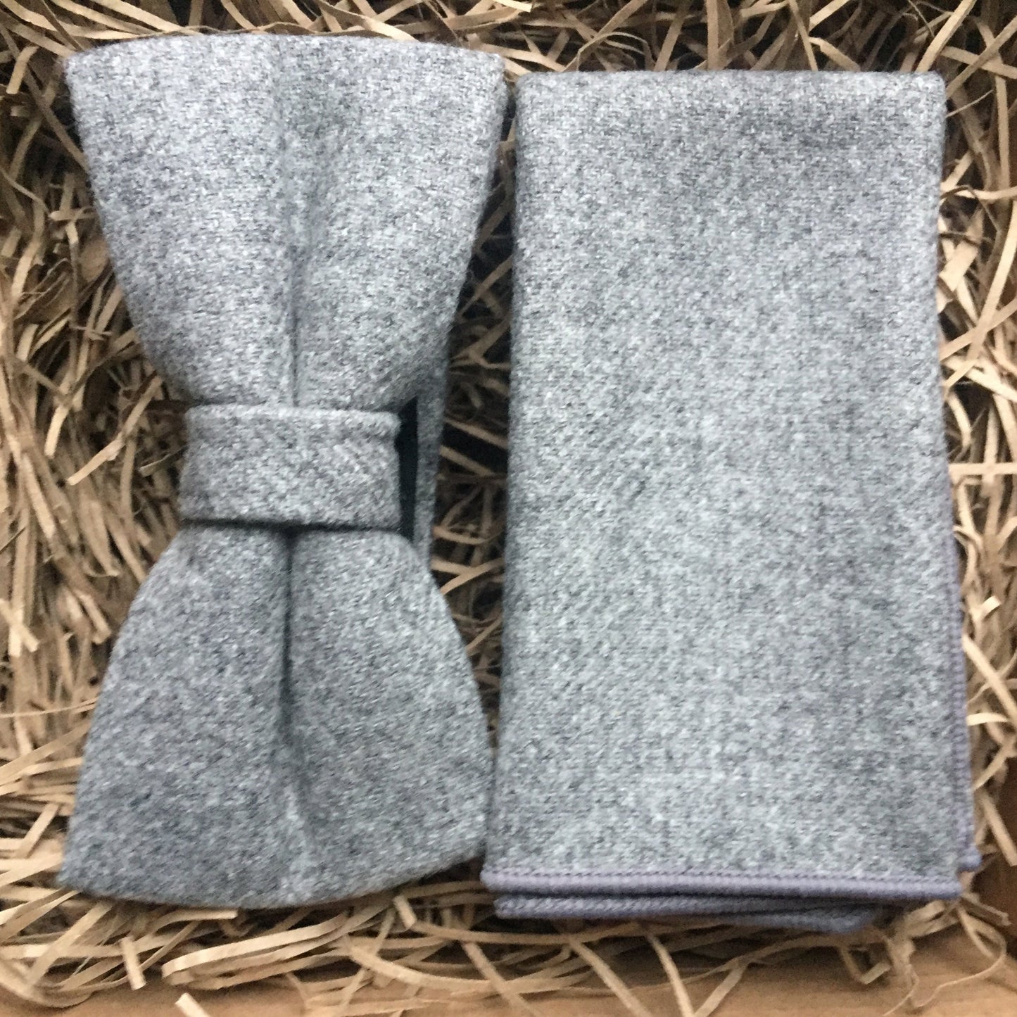 A grey mans wool bow tie and pocket square set. Ideal as a wedding tie and as a groomsman gift, groom's gift or a Christmas gift for men.
