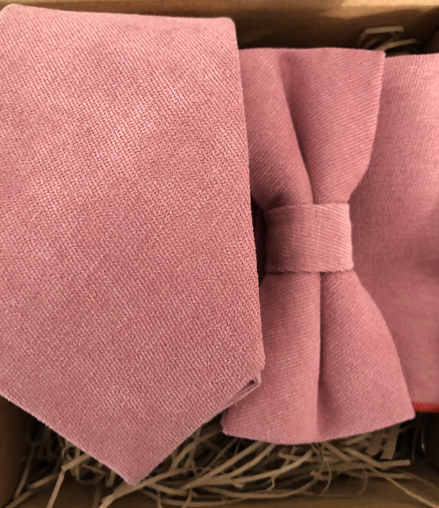 A dusty or dusky lush pink men's tie, bow tie and pocket square in high quality cotton ideal as a wedding tie. This is a formal tie and bow tie set which comes with free gift wrapping and makes an ideal men's gift and Christmas gift. made by hand at Daisy and Oak Studio.