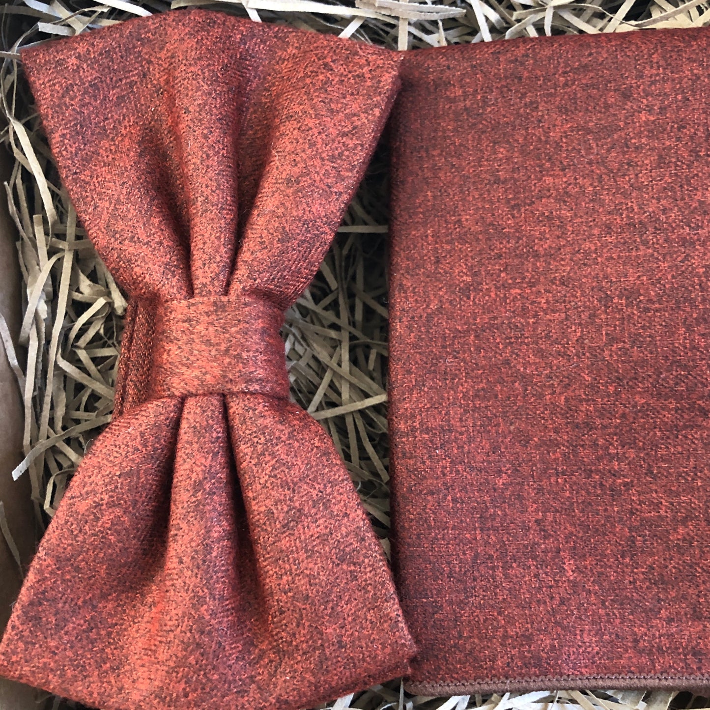A burnt orange or terracotta men's bow tie and pocket square. Perfect as a wedding bow tie or as a man'c gift wrapped Christmas present sold by Daisy and Oak Studio.