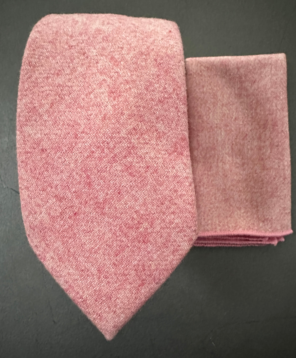  A pink tie and pocket square set in blush pink wool for grooms and groomsmen.