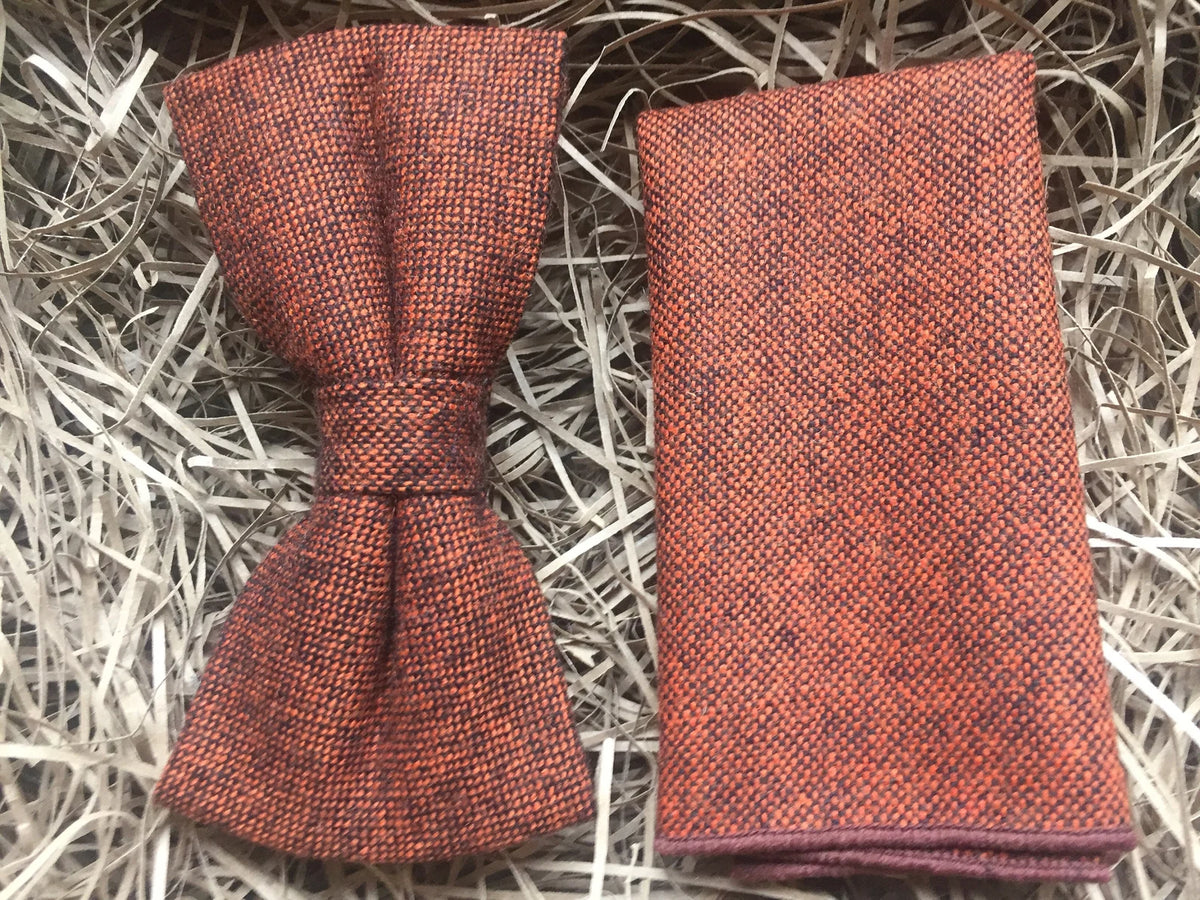 An orange wool bow tie and pocket square set for men and women.Ideal for grooms and groomsmen.