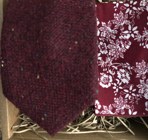A man's red, flecked wool tie and red floral cotton pocket square. The flecks in the tie are yellow, red and green and offer a stunning accessory to any man's suit. THe tie set is handmade at Daisy and Oak Studio.