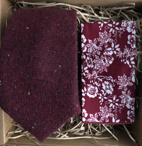 A man's red, flecked wool tie and red floral cotton pocket square. The flecks in the tie are yellow, red and green and offer a stunning accessory to any man's suit. THe tie set is handmade at Daisy and Oak Studio.