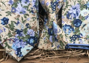 A men's bue floral tie, bow tie and pocket square set ideal for weddings and as men gifts. The set comes with free gift wrapping and is made at Daisy and Oak Studios, UK
