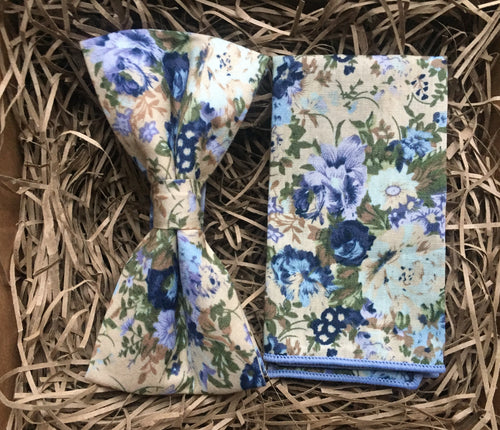 A men's blue floral bow tie and pocket square for weddings and formal occasions. The set  comes with free gift wrapping and isn ideal gift for men. Our ties and pocket squares are hand-made at the Daisy and Oak Studio.