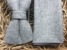 Load image into Gallery viewer, A close up of a grey mans wool bow tie and pocket square set. Ideal as a wedding tie and as a groomsman gift, groom&#39;s gift or a Christmas gift for men.