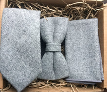 Load image into Gallery viewer, Grey wool tie, bow tie and pocket square perfect as a mens gift set, wedding ties, and gift set. The set is handmade by Daisy and Oak Studio and comes with free shipping and free gift wrap.