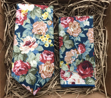 Load image into Gallery viewer, Men&#39;s red, floral tie and pocket square set. Ideal wedding ties and also available in a bow tie. This set is handmade in the Daisy and Oak Studio, UK