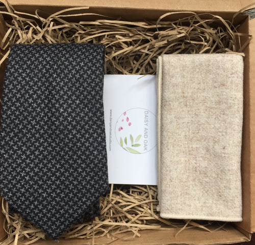 A grey chevron tie and cream wool pocket square. This tie and handkerchief set comes beautifully gift wrapped and is handmade at the Daisy and Oak Studio, UK