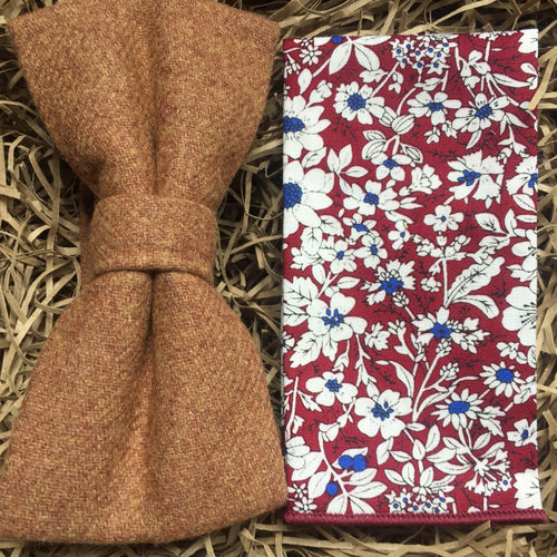 A camel brown men's bow tie and floral pocket square. The floral pocket square is red with white and blue flowers and together they make a perfect men's gift or wedding bow tie set.