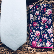 Load image into Gallery viewer, A duck egg blue men&#39;s cotton necktie and a blue floral pocket square. THis set is ideala s a men&#39;s gift or grooms tie, groomsmen gift. It comes superbly gift wrapped and is handmade at Daisy and Oak Studio