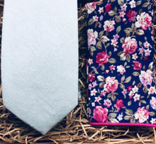 Load image into Gallery viewer, A duck egg blue men&#39;s cotton necktie and a blue floral pocket square. THis set is ideala s a men&#39;s gift or grooms tie, groomsmen gift. It comes superbly gift wrapped and is handmade at Daisy and Oak Studio