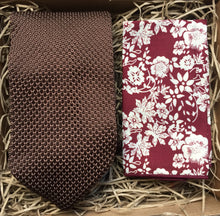 Load image into Gallery viewer, A brown knitted necktie for men and a red floral pocket square. The tie set comes with free gift wrap and is. handmade by Daisy and Oak Studio, UK