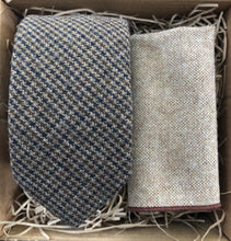 Load image into Gallery viewer, A houndstooth men&#39;s neckitie in tweed wool with  beige pocket square. The tie set comes gift wrapped and makes an ideal present for men for Christmas, for groomsmen and as a wedding tie.
