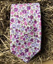 Load image into Gallery viewer, A lavender floral cotton men&#39;s tie with purple flowers and green accents. The ties are hand made by Daisy and Oak Studio and come gift wrapped so make ideal men&#39;s gifts and grooms and groomsmen ties.