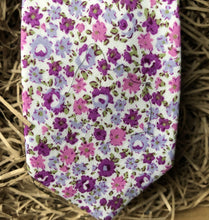 Load image into Gallery viewer, A lavender floral cotton men&#39;s tie with purple flowers and green accents. The ties are hand made by Daisy and Oak Studio and come gift wrapped so make ideal men&#39;s gifts and grooms and groomsmen ties.