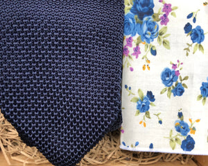 A man's tie in a navy knitted fabric and a white cotton pocket square handkerchief. The set is ideal as a men's gift and comes gift wrapped by Daisy and Oak Studio.