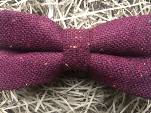 A red men's flecked wool tie. This bow tie is ideal for grooms and wedding guest ties. The bow tie is handmade by Daisy and Oak Studio and is gift wrapped to a stunning. men's gift.
