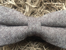 Load image into Gallery viewer, A close up photo of a light brown herringbone tweed bow tie for men. This is a beautiful gift for a men for Christmas or for a groom and his groomsmen at a wedding.
