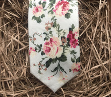 Load image into Gallery viewer, A pink floral men&#39;s tie on an ivory background. The set make a perfect men&#39;s gift and is handmade at the Daisy and Oak Studio, UK