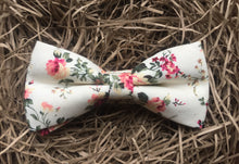 Load image into Gallery viewer, A cotton floral bow tie.  The Bow tie has a blush pink floral pattern and is pre-tied. The set is perfect for weddings, groomsmen ties and men&#39;s gifts. We gift wrap all of our products which are handmade at Daisy and Oak Studio.