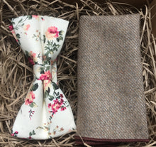 Load image into Gallery viewer, A cotton floral bow tie and beige wool pocket square. The Bow tie has a blush pink floral pattern and is pre-tied. The set is perfect for weddings, groomsmen ties and men&#39;s gifts.  We gift wrap all of our products which are handmade at Daisy and Oak Studio.