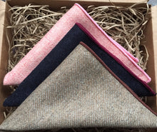 Load image into Gallery viewer, A photo of three inspired wool pocket squares in pink. navy blue and beige. The set makes a perfect gift for men as it is gift wrapped. t could also be a men&#39;s secret Santa gift, groomsmen or groom&#39;s gift. By Daisy and Oak Studio.