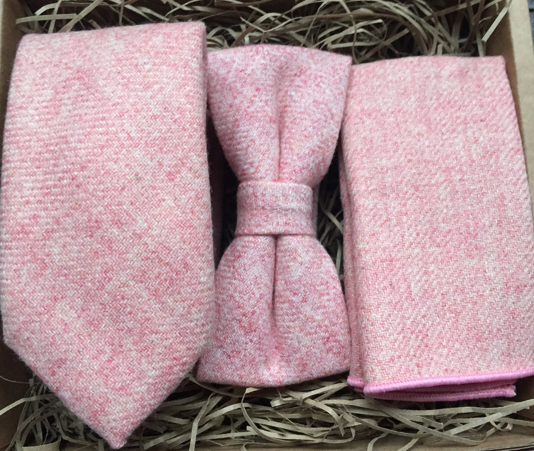 A blush pink men's tie in wool with a matching pink pocket square and bow tie. These ties are stunning men's gifts as they come gift wrapped in a box with string. Fabulous men's Christmas gift, secret Santa and groomsmen gifts by Daisy and Oak STudio.