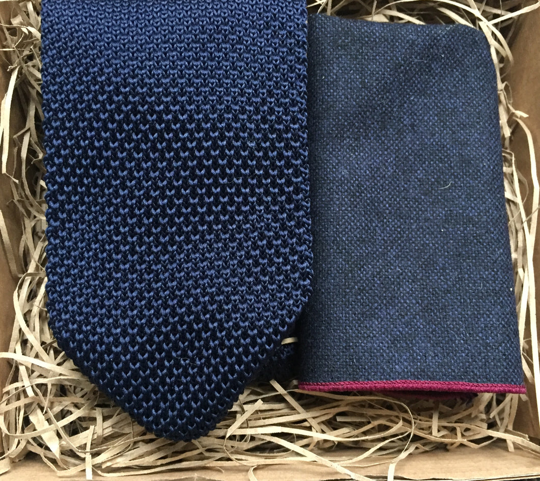A men's navy blue knitted men's tie and navy wool pocket square. The set comes  with free gift wrap and is handmade at Daisy and Oak Studio, UK
