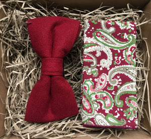 A deep red men's wool bow tie and paisley red pocket square by Daisy and Oak Studio. The set makes a stunning men's gift for Christmas or secret Santa. 