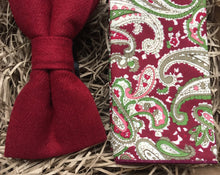 Load image into Gallery viewer, A deep red men&#39;s wool bow tie and paisley red pocket square by Daisy and Oak Studio. The set makes a stunning men&#39;s gift for Christmas or secret Santa. 