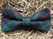 Load image into Gallery viewer, A green wool tartan bow tie which is gift wrapped and perfect as a formal tie, man&#39;s gift and is handmade by Daisy and Oak Studio, UK